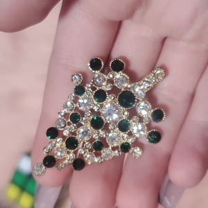 Christmas tree brooch with white and green jewels